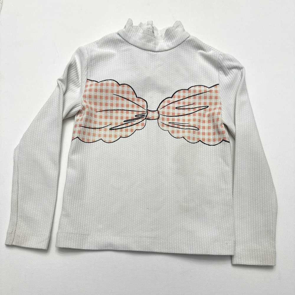 Marysia girl's long-sleeved rashguard featuring a pink gingham bow.  Size 1T.